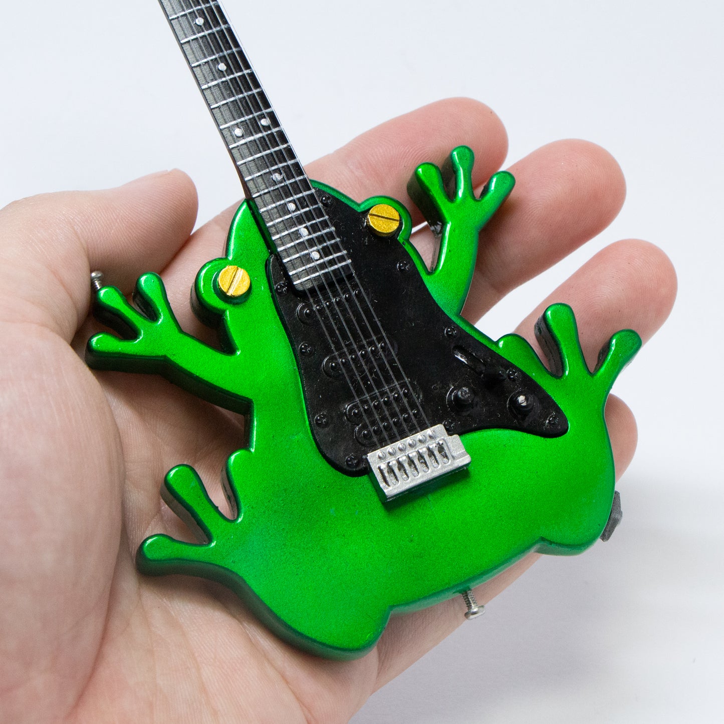 Guitare grenouille cool avec une sensation de luxe